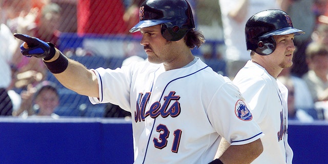 New York Mets' catcher Mike Piazza after hitting a solo homer in the fifth inning during game against Montreal Expos at Shea Stadium.