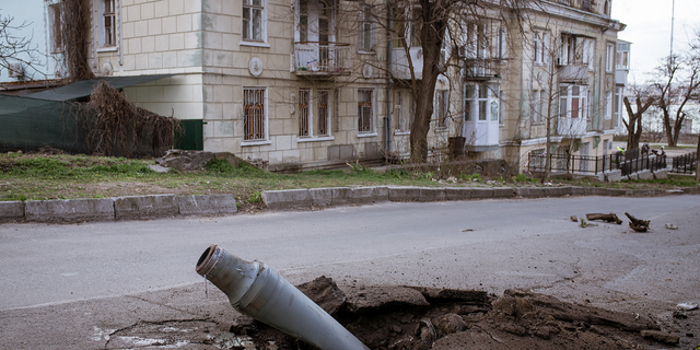 A fallen rocket that was fired from Kherson but got intercepted by Ukrainian forces remains unexploded in the street in Mykolaiv, Ukraine on April 4.