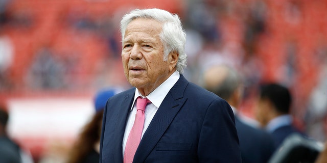 New England Patriots owner Robert Kraft walks the turf ahead of the Redskins game on Oct. 6, 2019, in Washington.