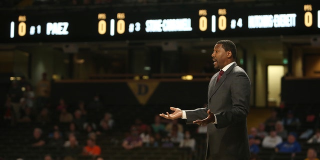 Austin Peay Governors head coach Nate James holds out his hands out questioning a call from officials during a game between the Vanderbilt Commodores and Austin Peay Governors, Dec. 18, 2021, at Memorial Gymnasium in Nashville, Tennessee.