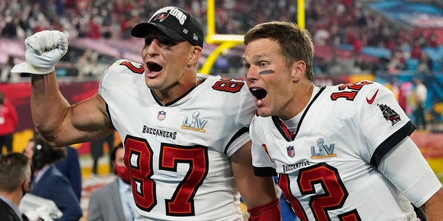 Tampa Bay Buccaneers tight end Rob Gronkowski, left, and quarterback Tom Brady celebrate after defeating the Kansas City Chiefs in the NFL Super Bowl 55 football game Sunday, Feb. 7, 2021, in Tampa, Fla.