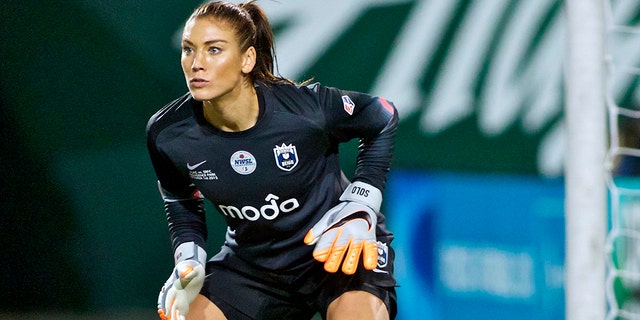 In this Oct. 1, 2015, file photo, Seattle Reign FC goalkeeper Hope Solo follows the action during the second half of the NWSL soccer championship match in Portland, Ore.