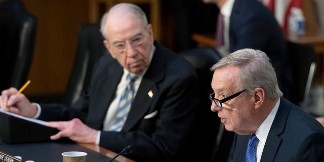 Sen. Chuck Grassley, R-Iowa, the ranking member of the Senate Judiciary Committee, left, listens as Sen. Dick Durbin, D-Ill., chairman of the Senate Judiciary Committee, speaks during Supreme Court nominee Judge Ketanji Brown Jackson's confirmation hearing before the Senate Judiciary Committee.