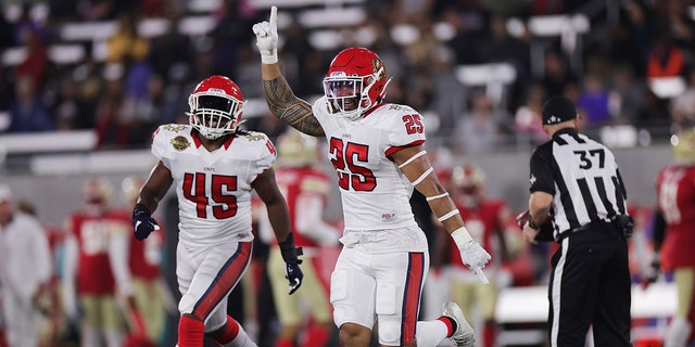 Shalom Luani of New Jersey Generals celebrates an interception against the Birmingham Stallions at Protective Stadium on April 16, 2022, in Birmingham, Alabama.