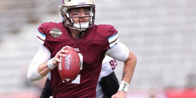 Shea Patterson of the Michigan Panthers runs with the ball against the Houston Gamblers at Protective Stadium on April 17, 2022, in Birmingham, Alabama.