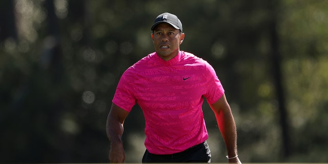 Tiger Woods walks to the 18th green during the first round of the Masters at Augusta National Golf Club on April 07, 2022 in Augusta, Georgia.
