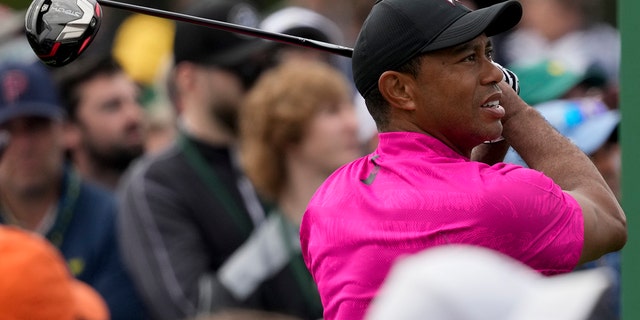 Tiger Woods watches his tee shot on the first hole at the Masters on Thursday, April 7, 2022, in Augusta.