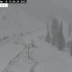 I-80 facing wind closures in SE Wyoming; chain law in effect over Teton Pass with snow falling in the west