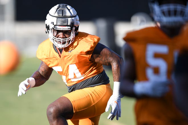 Tennessee defensive lineman Tyre West participates in a drill during Tennessee football spring practice at University of Tennessee, Thursday, March 24, 2022.