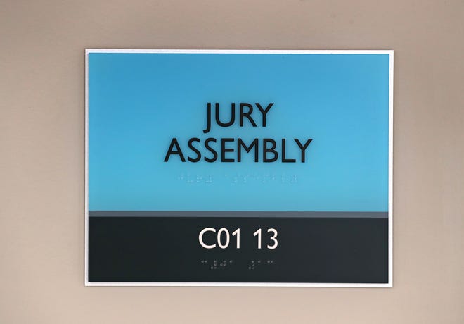 A sign marks the jury assembly room Friday, March 11, 2022 at the new Marion County Courthouse building on the Community Justice Campus.