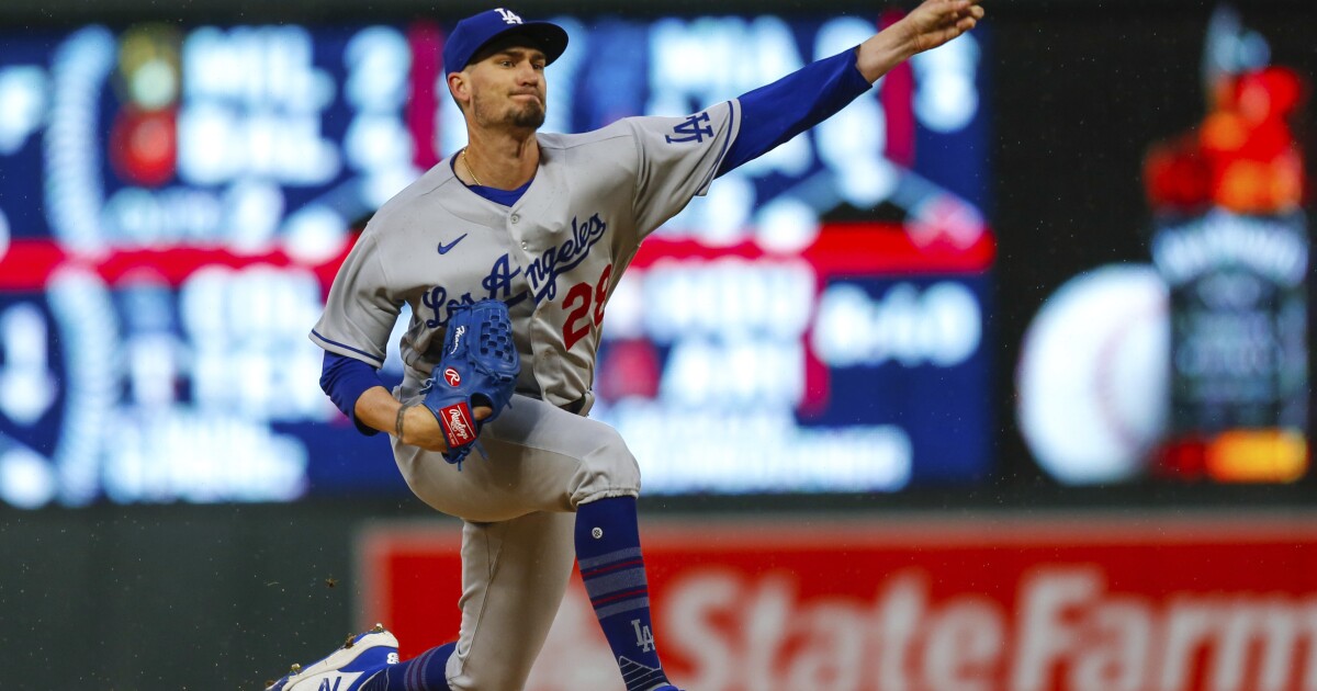 Andrew Heaney’s first Dodgers start is strong in team’s rain-delayed win over Twins