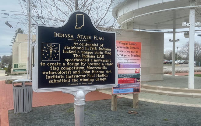 A historical marker commemorating the Indiana State Flag stands at the intersection of Main and Indiana streets in downtown Mooresville.