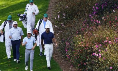 Masters winner gets a green jacket. His caddie also gets a piece of history