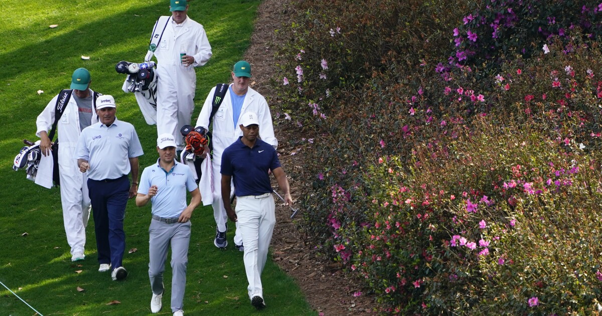 Masters winner gets a green jacket. His caddie also gets a piece of history