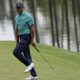 Tiger Woods rallies with four birdies and will make cut at Masters