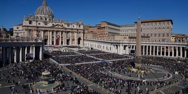 A view of St. Peter's Square at the Vatican as Pope Francis celebrates Palm Sunday Mass Sunday, April 10, 2022. 