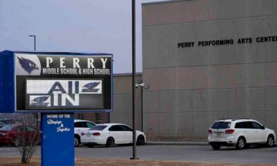 Iowa high school principal, hailed as hero for protecting students during school shooting, dies of injuries