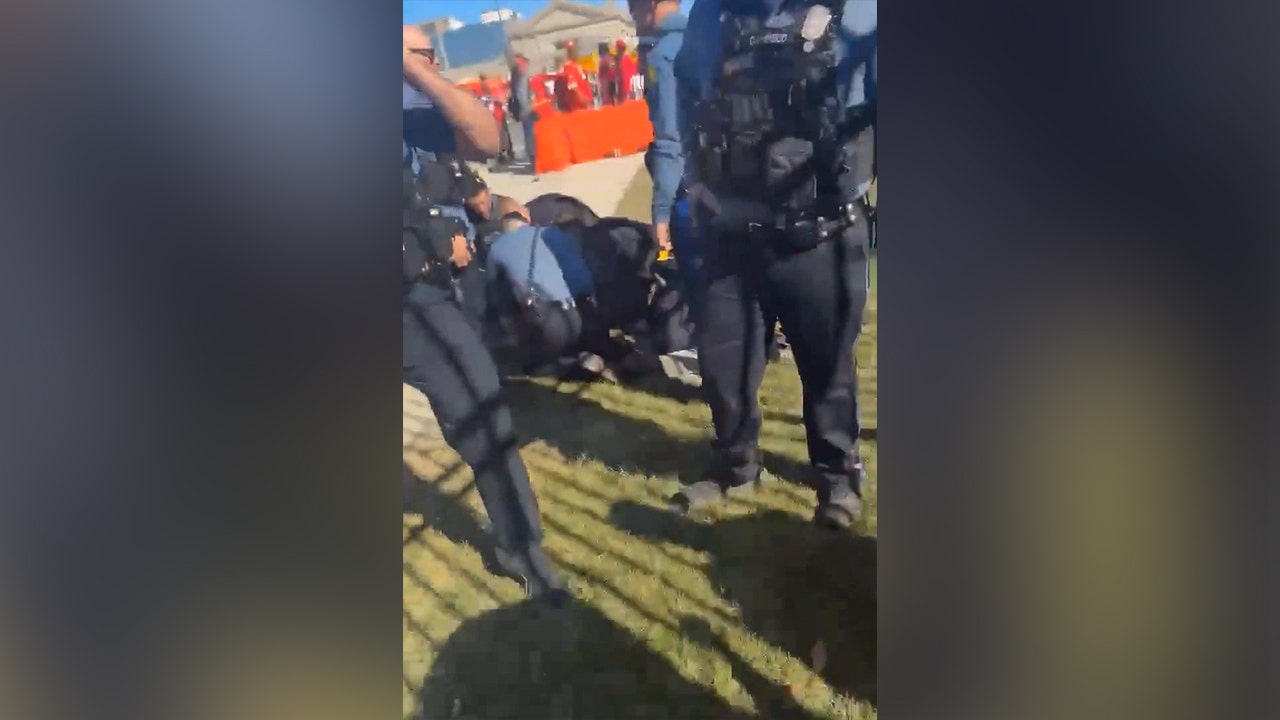 Kansas City Chiefs fans tackle man they suspected opened fire during Super Bowl parade: 'I got the gun'