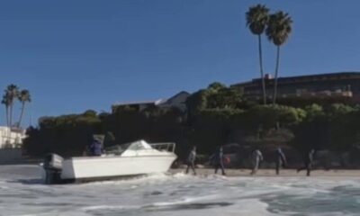 Suspected illegal migrants land boat on San Diego beach and flee into wealthy village
