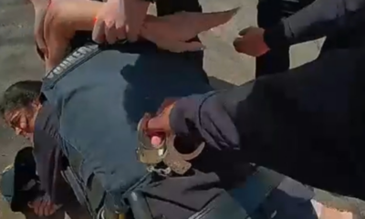 Video captures chaotic New York migrant shelter arrests as woman obstructs officers