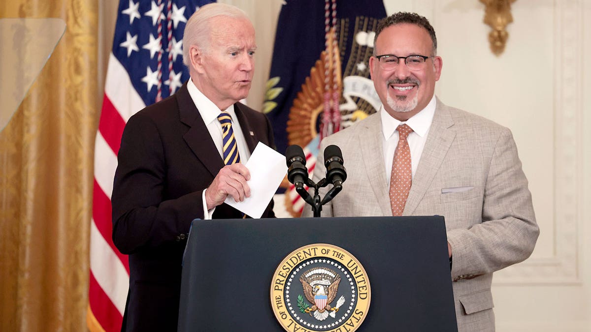 President Joe Biden and Education Secretary Miguel Cardona deliver remarks during an event for the 2022 National and State Teachers of the Year in the East Room of the White House on April 27, 2022 in Washington, D.C.
