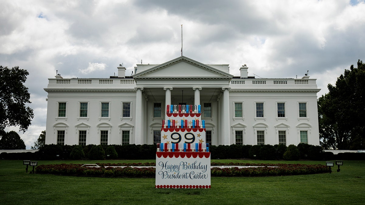 The White House with a birthday sign for Jimmy Carter