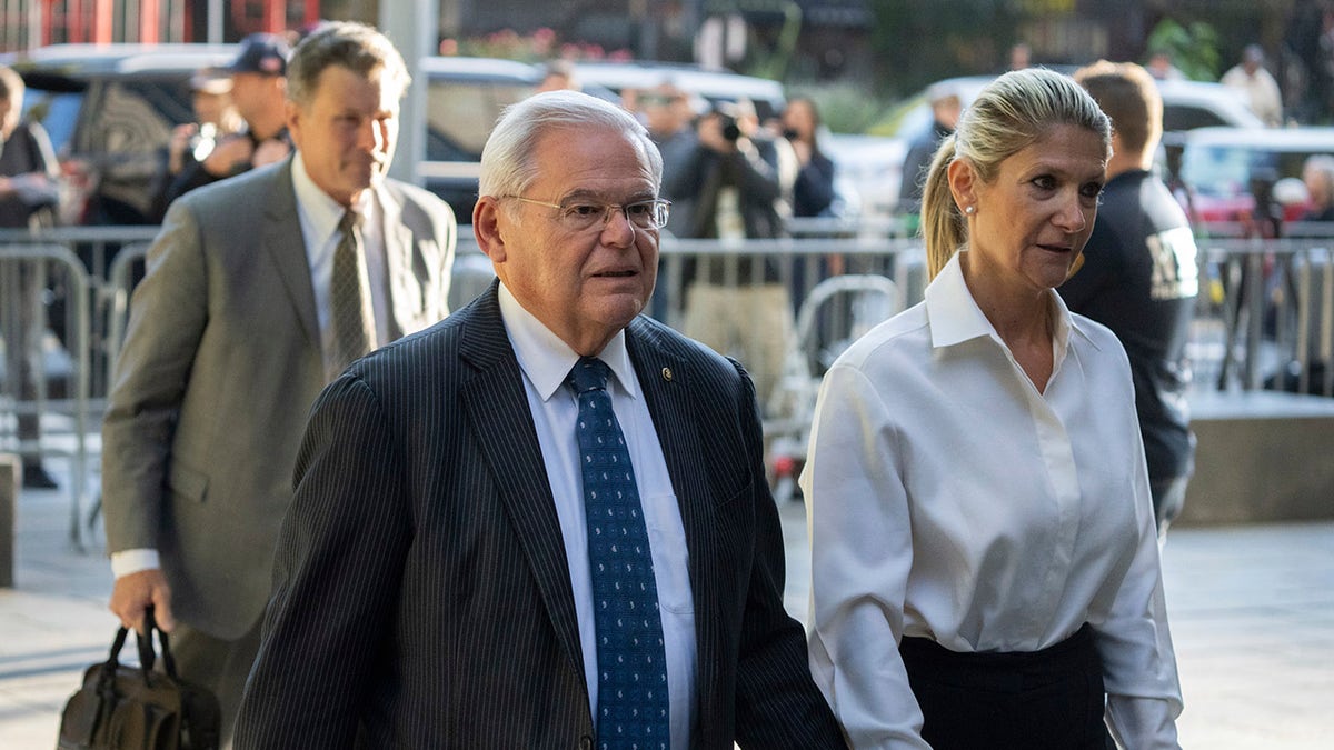 Menendez and his wife enter court in New York City