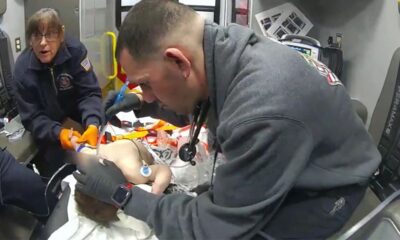 Bodycam captures moment hero first responders save 11-month-old baby's life as deadbeat dad faces charges