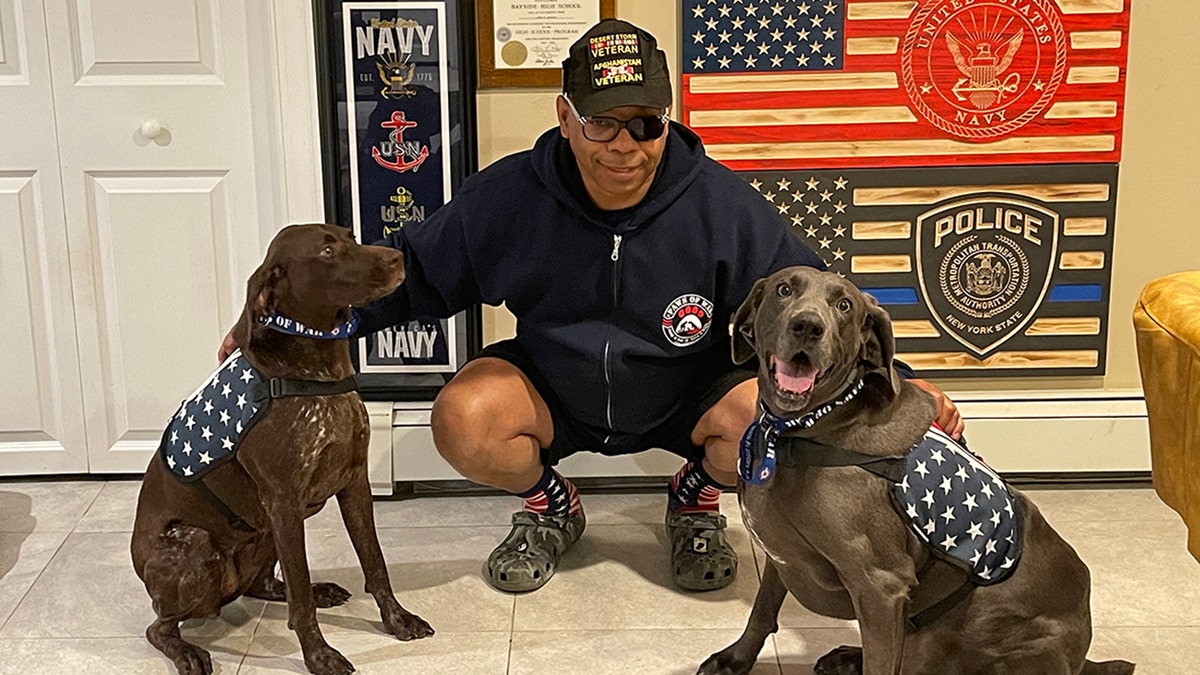 john barnett and his two service dogs