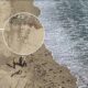 Kite surfer uses rocks to spell out 'HELP' in sand to prompt rescue at California beach
