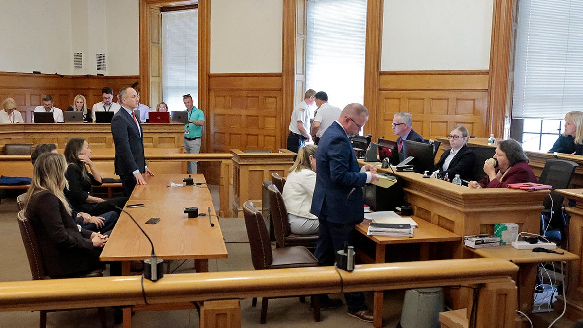 Judge Beverly J. Cannone, right, speaks to the defense and prosecution during the Karen Read trial