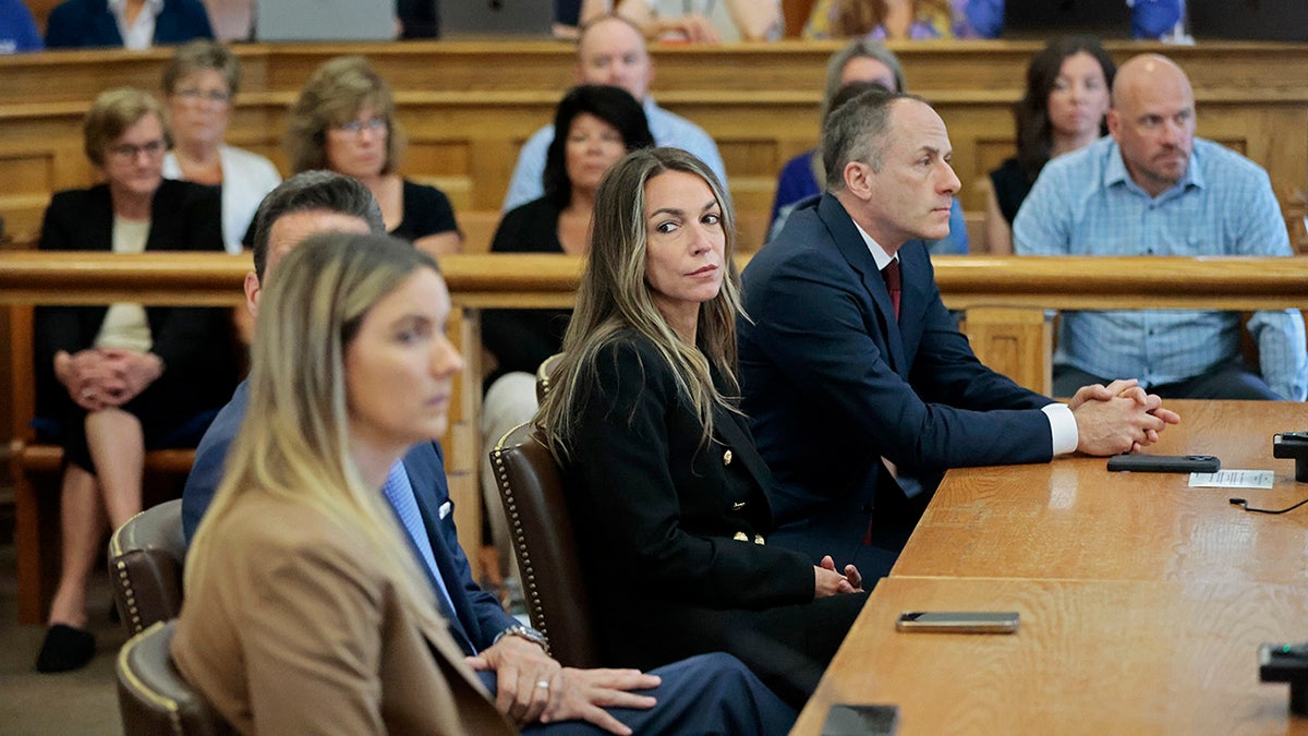 Karen Read listens as Judge Beverly J. Cannone greets the jury