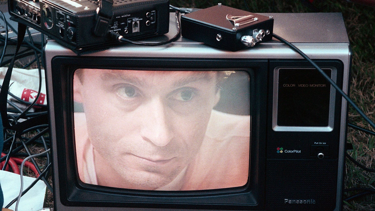 Ted Bundy's image on a television screen