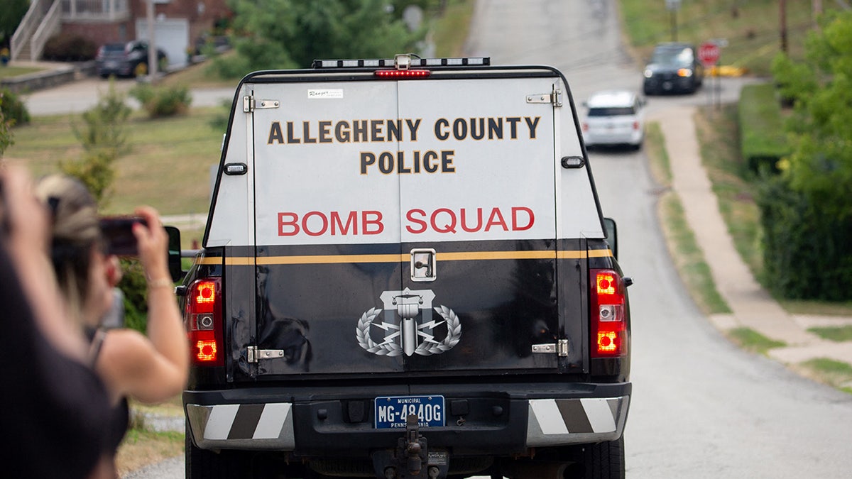 An Allegheny County Police Bomb Squad car drives towards the home of Thomas Matthew Crooks