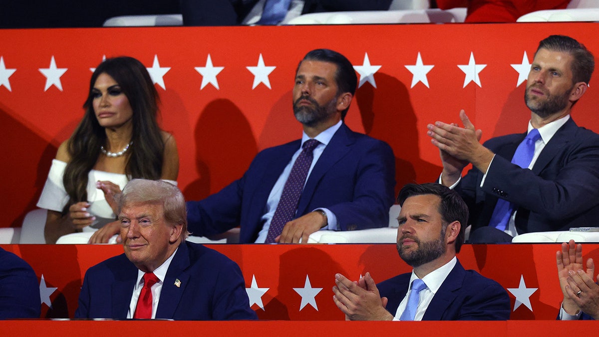 Republican presidential nominee and former U.S. President Donald Trump and Republican vice presidential nominee J.D. Vance sit with Donald Trump Jr., Kimberly Guilfoyle and Eric Trump