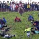 Annual cheese rolling race attracts thousands to England's Cooper’s Hill