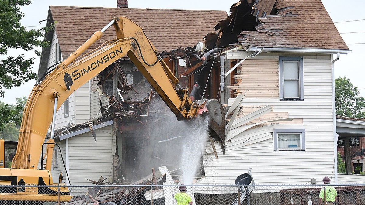Shawn Grates house being torn down.