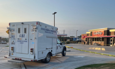 Georgia police fatally shoot man waving machine gun around near gas station