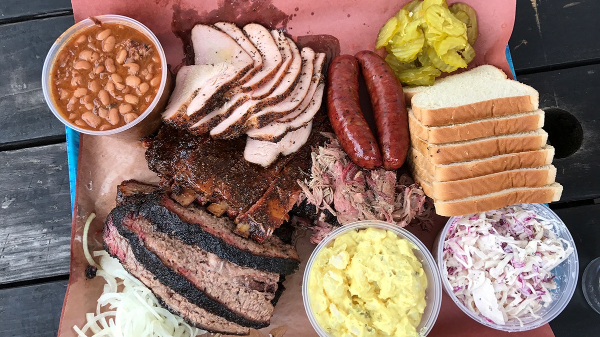 Platter of barbecue and sides.