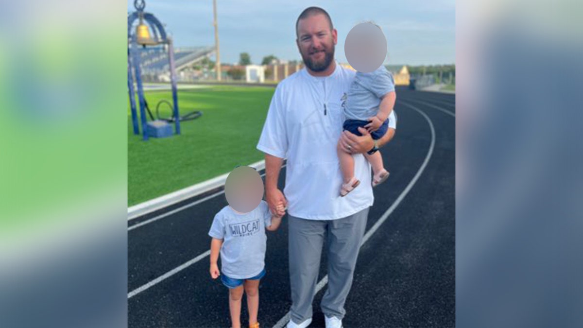 Richard Aspinwall at the track with his two kids.