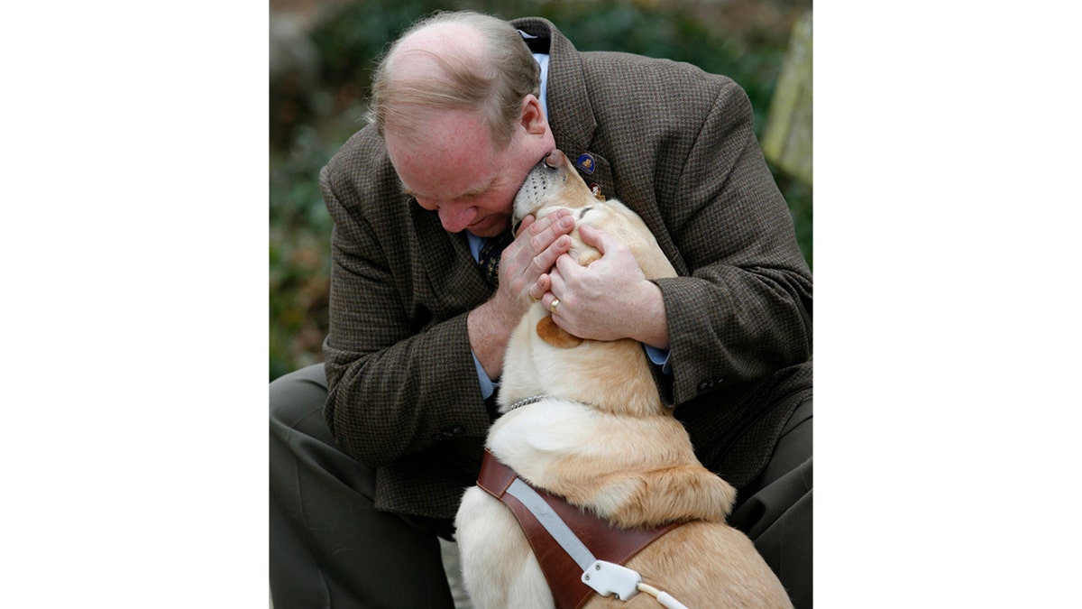 Michael Hingson with his guide dog Roselle