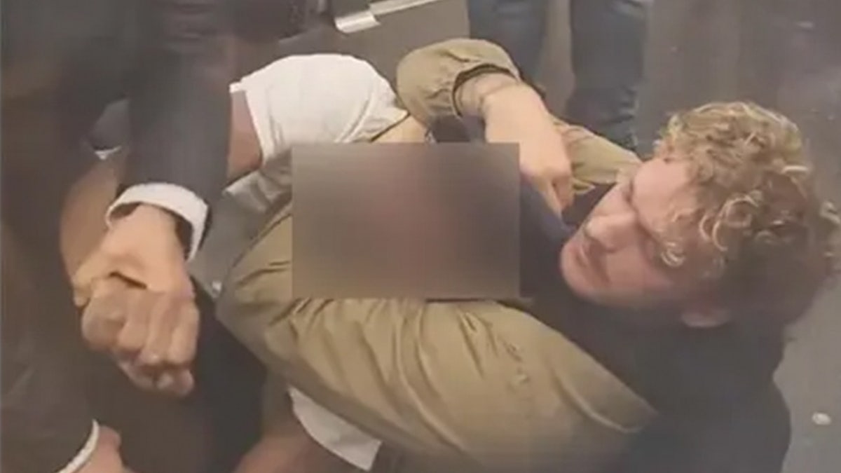 Daniel Penny shown holding Jordan Neely in a chokehold.