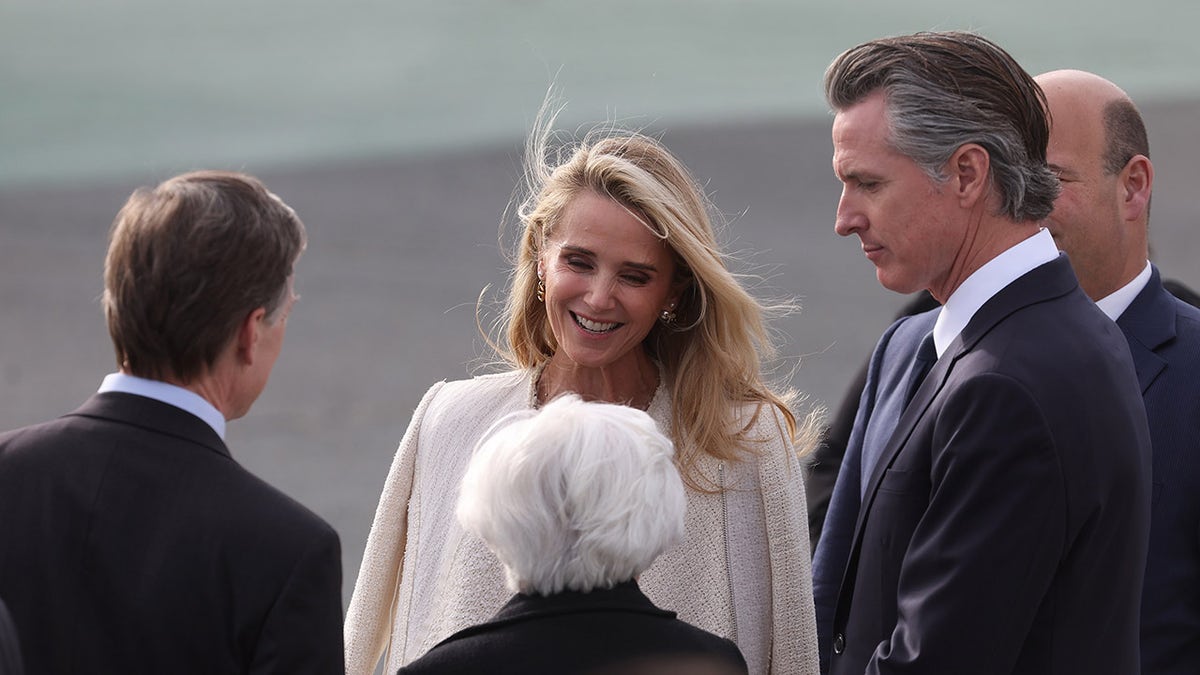 Newsom and wife