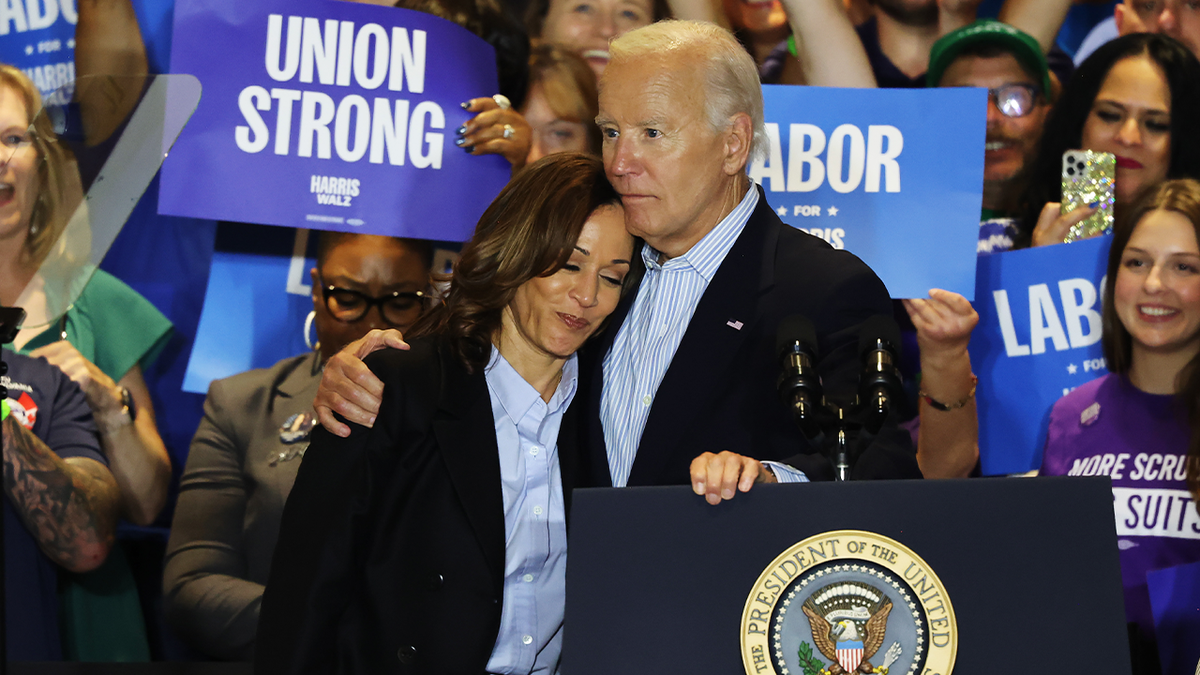 Kamala Harris head on President Joe Biden shoulders