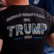 Police officers tailgate at Trump rally, call for death penalty for cop killers