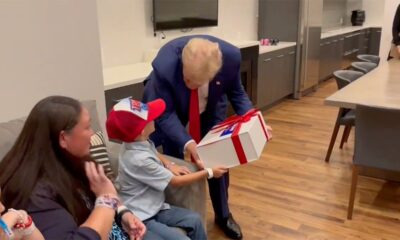‘Trump 2024!': Young supporter with rare brain disorder beams after surprise meeting with former president