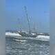 New Jersey rescue crews save 2 from disabled sailboat off popular beach