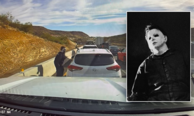 Man dressed up as iconic Halloween villain scares drivers in standstill traffic: video