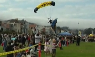 Navy parachutist crash-lands on mother and teenager during San Francisco performance: video