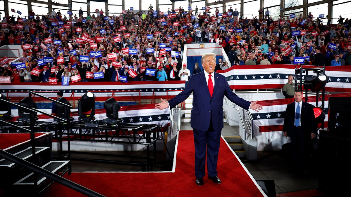 Republican presidential nominee, former President Donald Trump takes the stage during a campaign rally at the J.S. Dorton Arena on Nov. 4, 2024 in Raleigh, North Carolina.